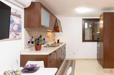 Cucina o angolo cottura di Cala Sinzias Jo Beach
