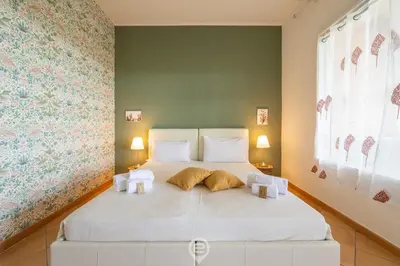 Letto o letti in una camera di Villa Erika