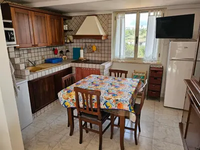 Cucina o angolo cottura di Calasetta, il tramonto sul mare