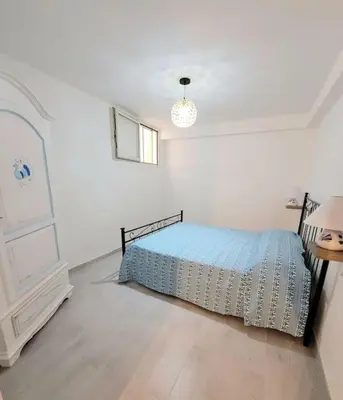 Letto o letti in una camera di Casa Narciso Villasimius