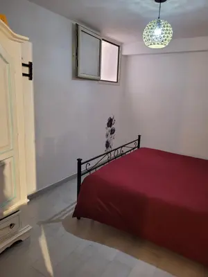 Letto o letti in una camera di Casa Narciso Villasimius