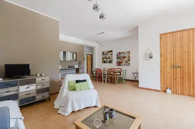 TV o dispositivi per l'intrattenimento presso Villa Girasole - Calice Apartment