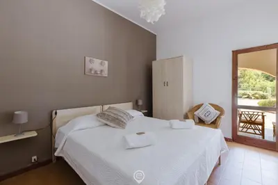 Letto o letti in una camera di Villa Girasole - Calice Apartment