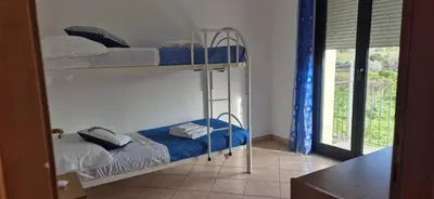 Letto o letti in una camera di Alessia