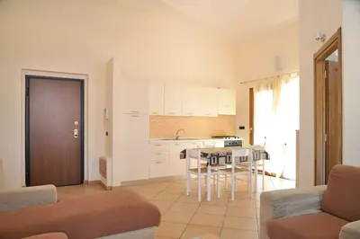Cucina o angolo cottura di I Pini - appartamento mare Sardegna