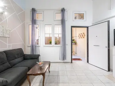 Area soggiorno di Civico 35 Cozy Loft Cagliari