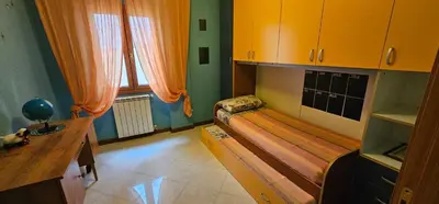 Letto o letti in una camera di Da nonna Assunta