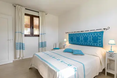 Letto o letti in una camera di Casa Paola