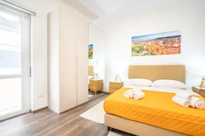 Letto o letti in una camera di Terrazza Garibaldi, Centro storico