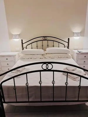 Letto o letti in una camera di Villa Del Sole