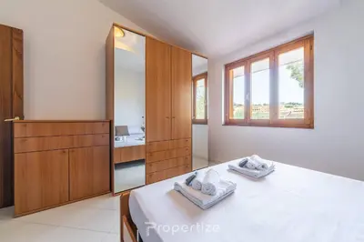 Letto o letti in una camera di Relax Sea Home by Propertize - Villasimius