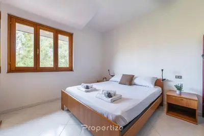 Letto o letti in una camera di Relax Sea Home by Propertize - Villasimius