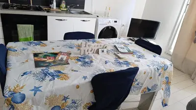 Cucina o angolo cottura di Casa Vacanze condominio I Giardini, Pula