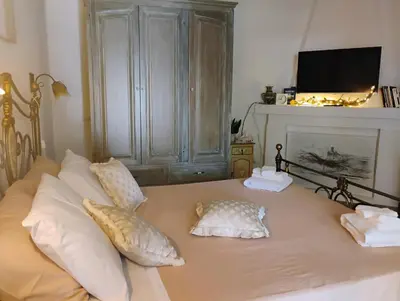 Letto o letti in una camera di La casa del glicine Marrubiu