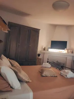 Letto o letti in una camera di La casa del glicine Marrubiu