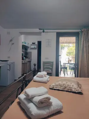 Letto o letti in una camera di La casa del glicine Marrubiu