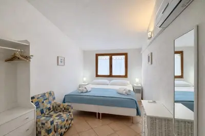 Letto o letti in una camera di Domus Mirta