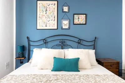Letto o letti in una camera di Casa Mistral