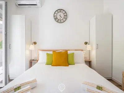 Letto o letti in una camera di Monteverdi Apartments - Studio 2