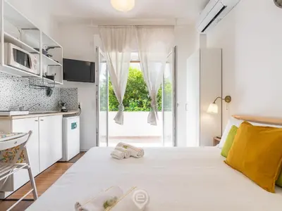 Letto o letti in una camera di Monteverdi Apartments - Studio 2