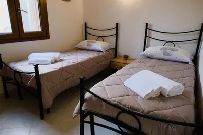 Letto o letti in una camera di Casa Paola 300m Con Vista Mare