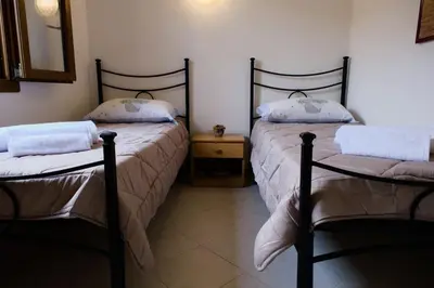 Letto o letti in una camera di Casa Paola 300m Con Vista Mare