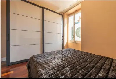 Letto o letti in una camera di Vintage Flat