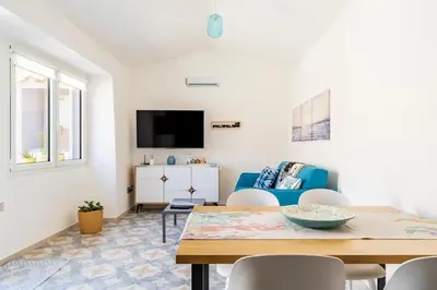 TV o dispositivi per l'intrattenimento presso Bilocale la terrazza sul centro