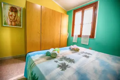 Letto o letti in una camera di Casa Betta - Sea View - Garden IUNQ0627