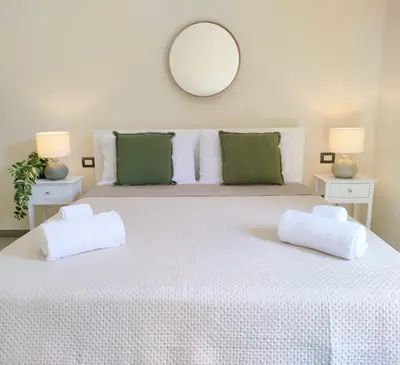 Letto o letti in una camera di Casa Laurina