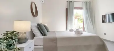 Letto o letti in una camera di Casa Laurina