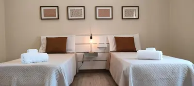 Letto o letti in una camera di Casa Laurina