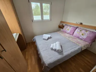 Letto o letti in una camera di Little White House