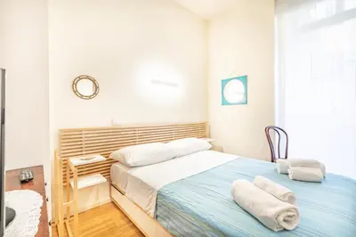 Letto o letti in una camera di Carducci - Cagliari Centro