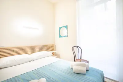 Letto o letti in una camera di Carducci - Cagliari Centro