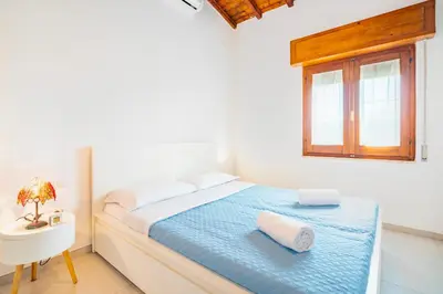 Letto o letti in una camera di Oasi a Margine Rosso