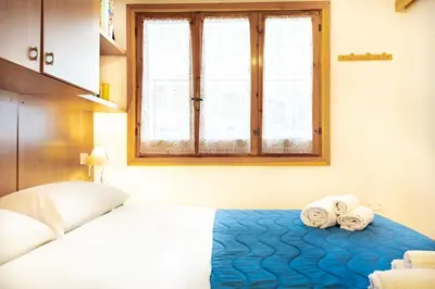 Letto o letti in una camera di Villetta degli Oleandri - Geremeas 2