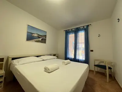 Letto o letti in una camera di Orizzonte Blu