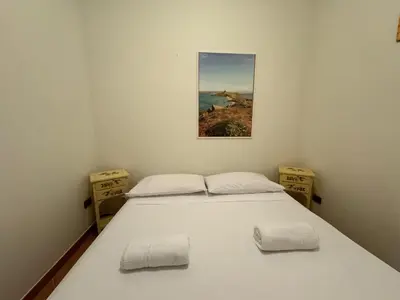 Letto o letti in una camera di Orizzonte Blu