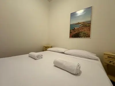 Letto o letti in una camera di Orizzonte Blu