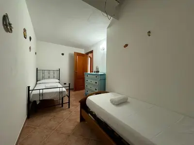 Letto o letti in una camera di Orizzonte Blu