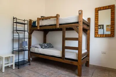 Letto o letti in una camera di Villa Amea