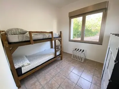Letto o letti in una camera di Villa Amea