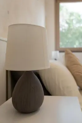 Letto o letti in una camera di Villa Amea