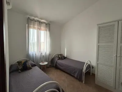 Letto o letti in una camera di La Bouganvillea