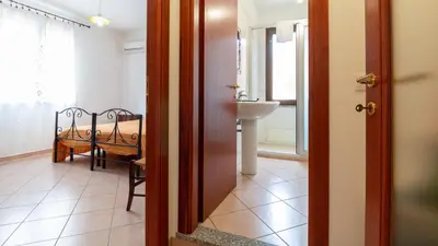 Letto o letti in una camera di Casa Via Leopardi 124