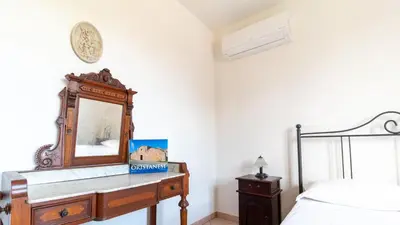 Letto o letti in una camera di Casa Via Leopardi 124