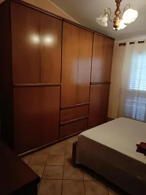 Letto o letti in una camera di Casa Paola