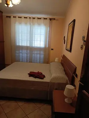 Letto o letti in una camera di Casa Paola