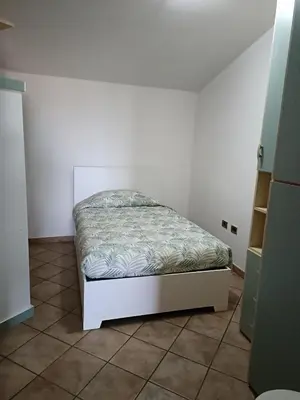 Letto o letti in una camera di Casa Paola